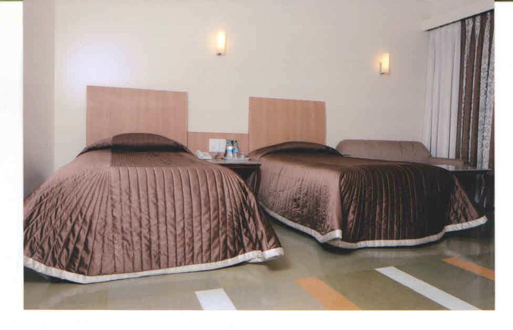 Hotel Khimji Bhagwandas Arogyabhavan Nášik Pokoj fotografie