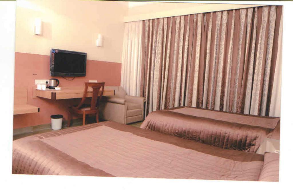 Hotel Khimji Bhagwandas Arogyabhavan Nášik Pokoj fotografie